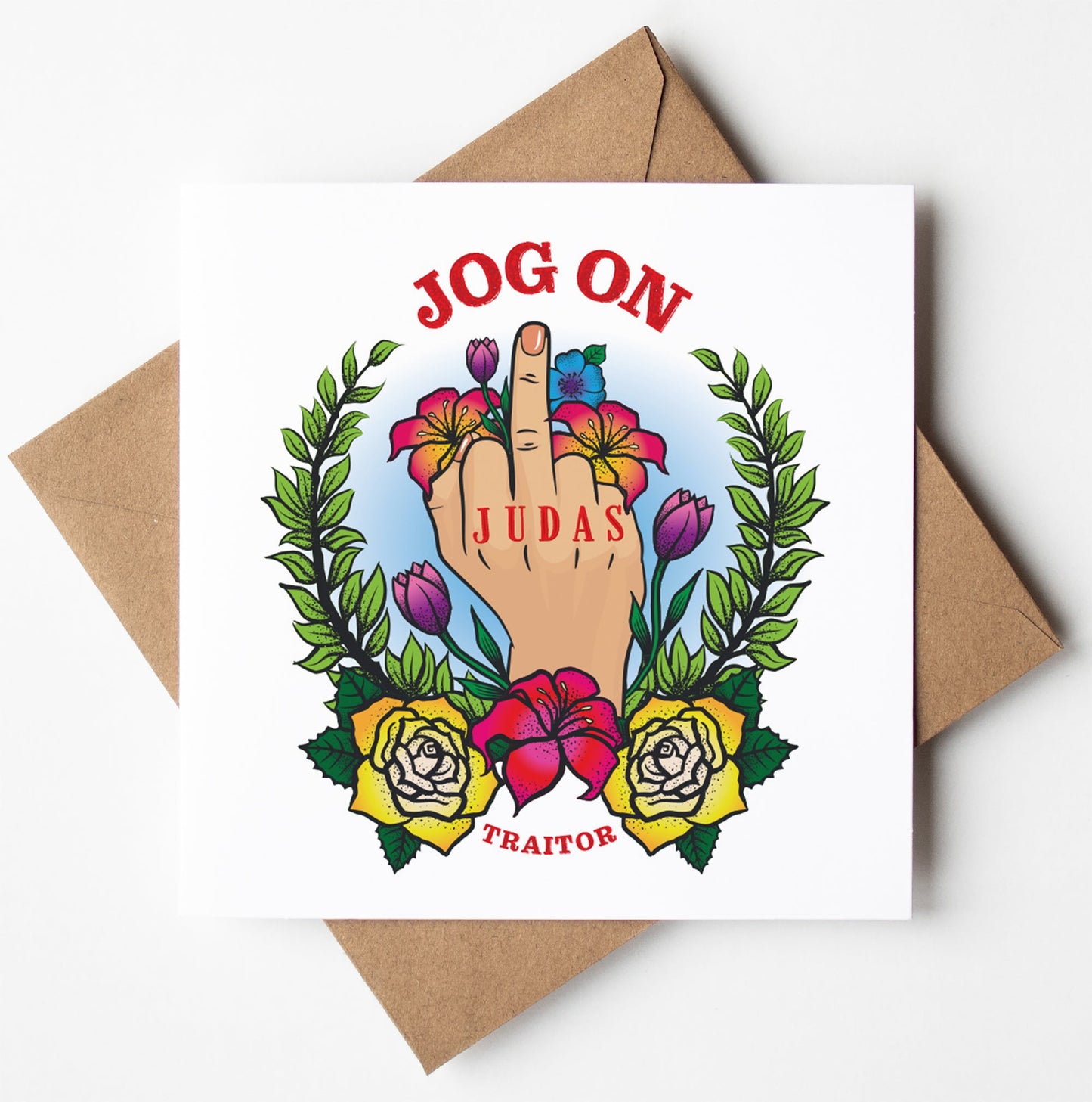Introducing the Jog On Judas Tattoo Card, a humor-filled farewell card that highlights a playful illustration of a hand making an irreverent gesture, encircled by vibrant flowers and leaves. Its cheeky charm is further enhanced by the bold statement "JOG ON JUDAS TRAITOR," making it ideal for someone looking to capture that rude retirement card aesthetic. This card pairs perfectly with its accompanying classic brown envelope.