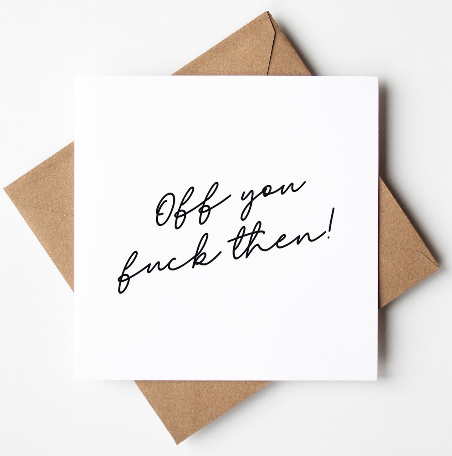 The "Off You Fuck Script Card" is a funny, rude retirement card with the handwritten message "Off you fuck then!" in black script on a white card over a brown envelope; blank inside for your own message.