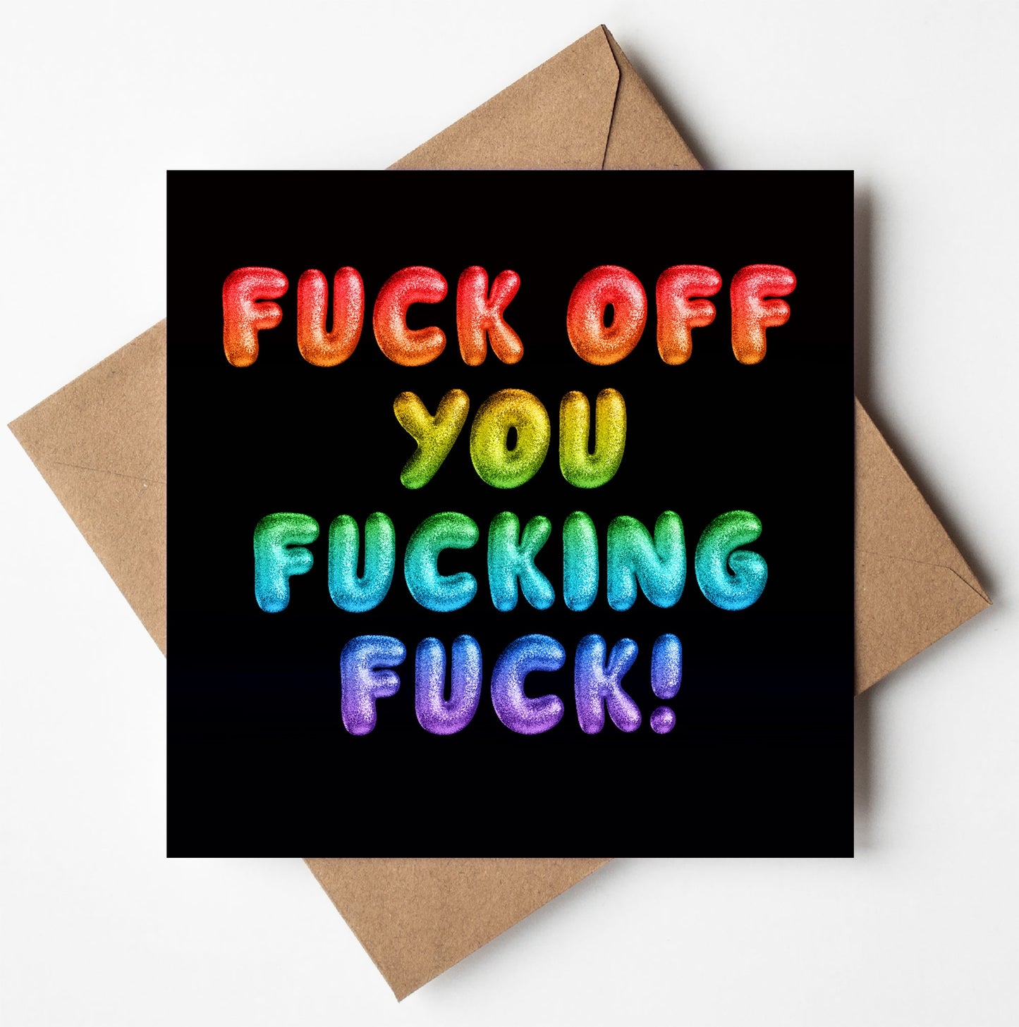 A vivid rainbow font spells out "Fuck Off You Fucking Fuck!" with colorful 3D letters against a black background, featuring gradients of red, orange, yellow, green, blue, and purple. Below the striking design is a brown envelope prepared for worldwide shipping.