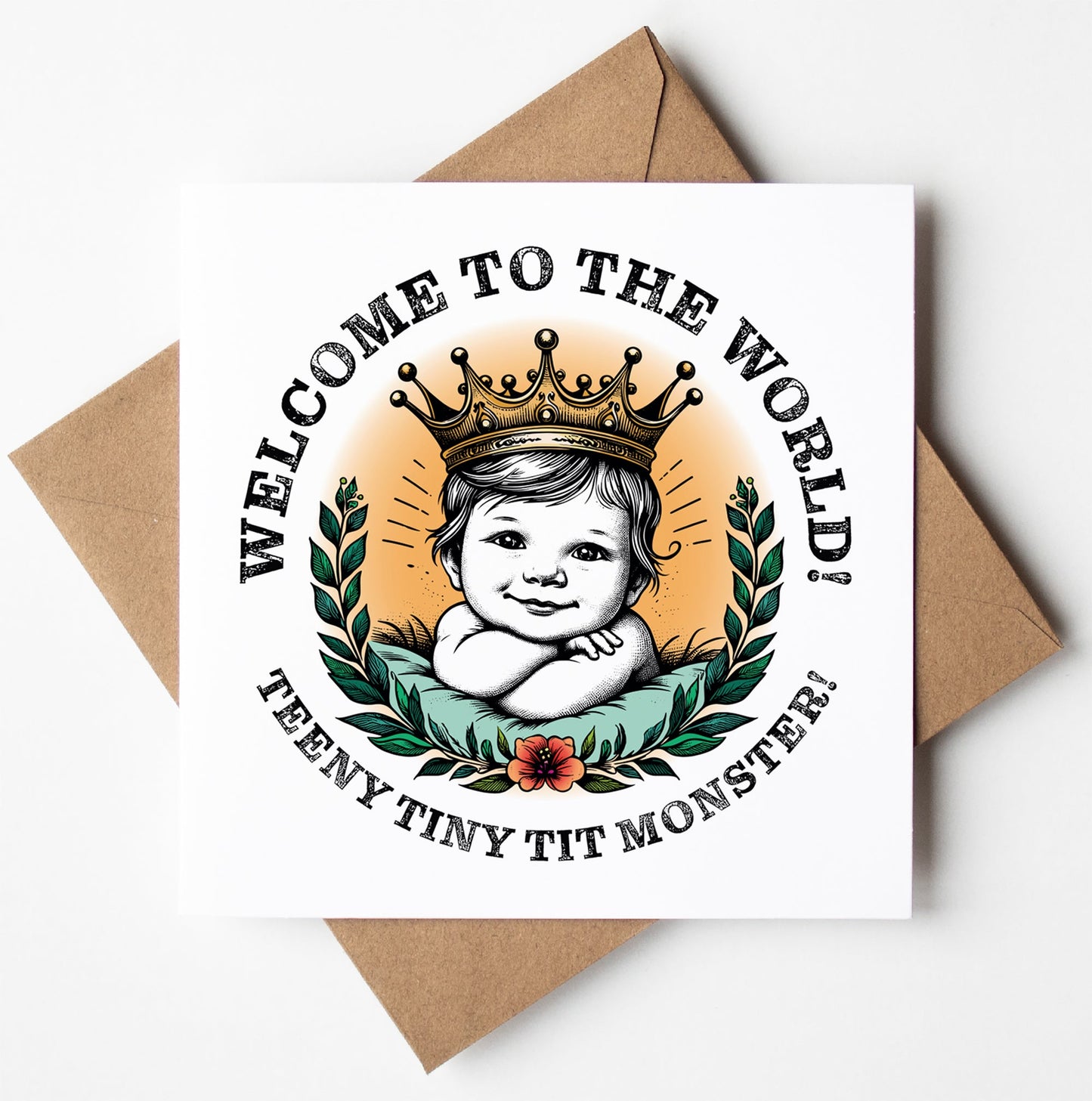 A New Baby Card titled "Welcome To The World Teeny Tiny Tit Monster!" showcases an illustration of a smiling baby adorned with a golden crown, encircled by laurel leaves and a delicate flower. Ideal for those who desire Sweary Congratulations delivered with flair.