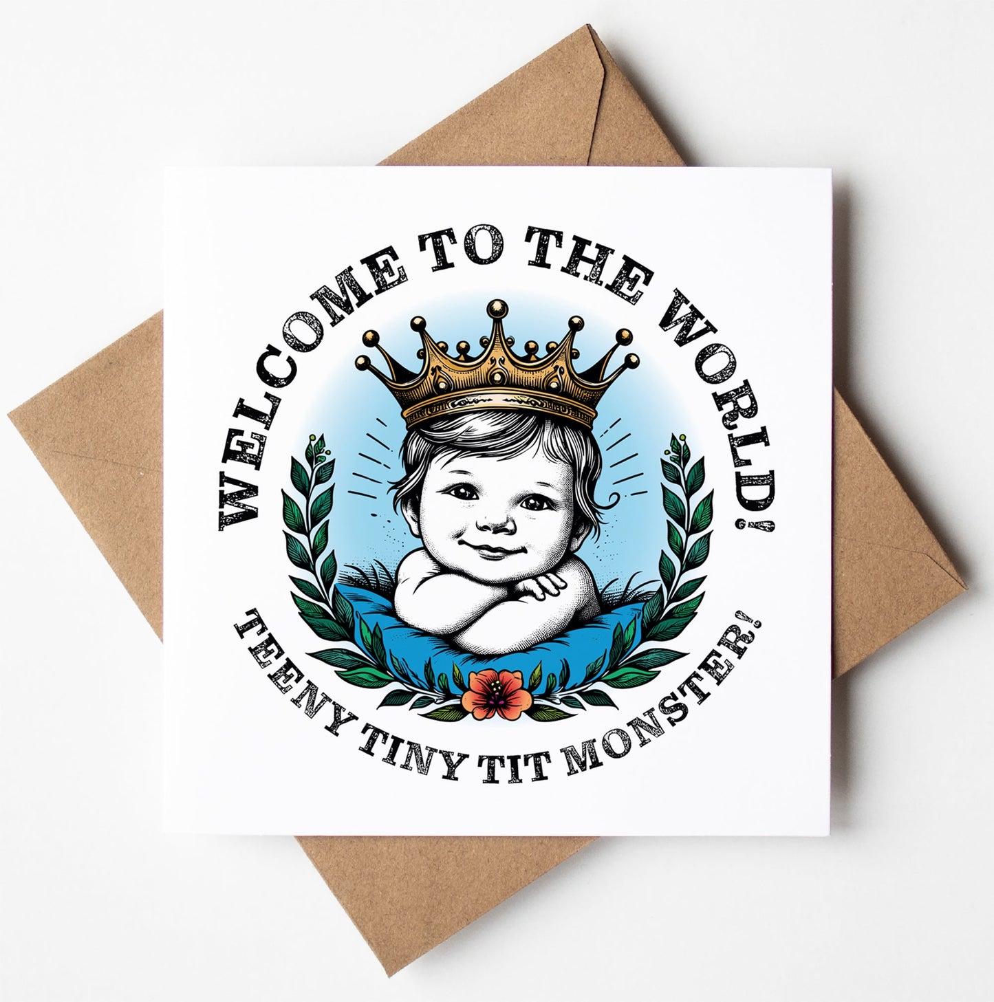 Card featuring an illustration of a baby with a crown, surrounded by leaves and a flower, accompanied by the text "Welcome to the World! Teeny Tiny Tit Monster!" This playful card is paired with a brown envelope.