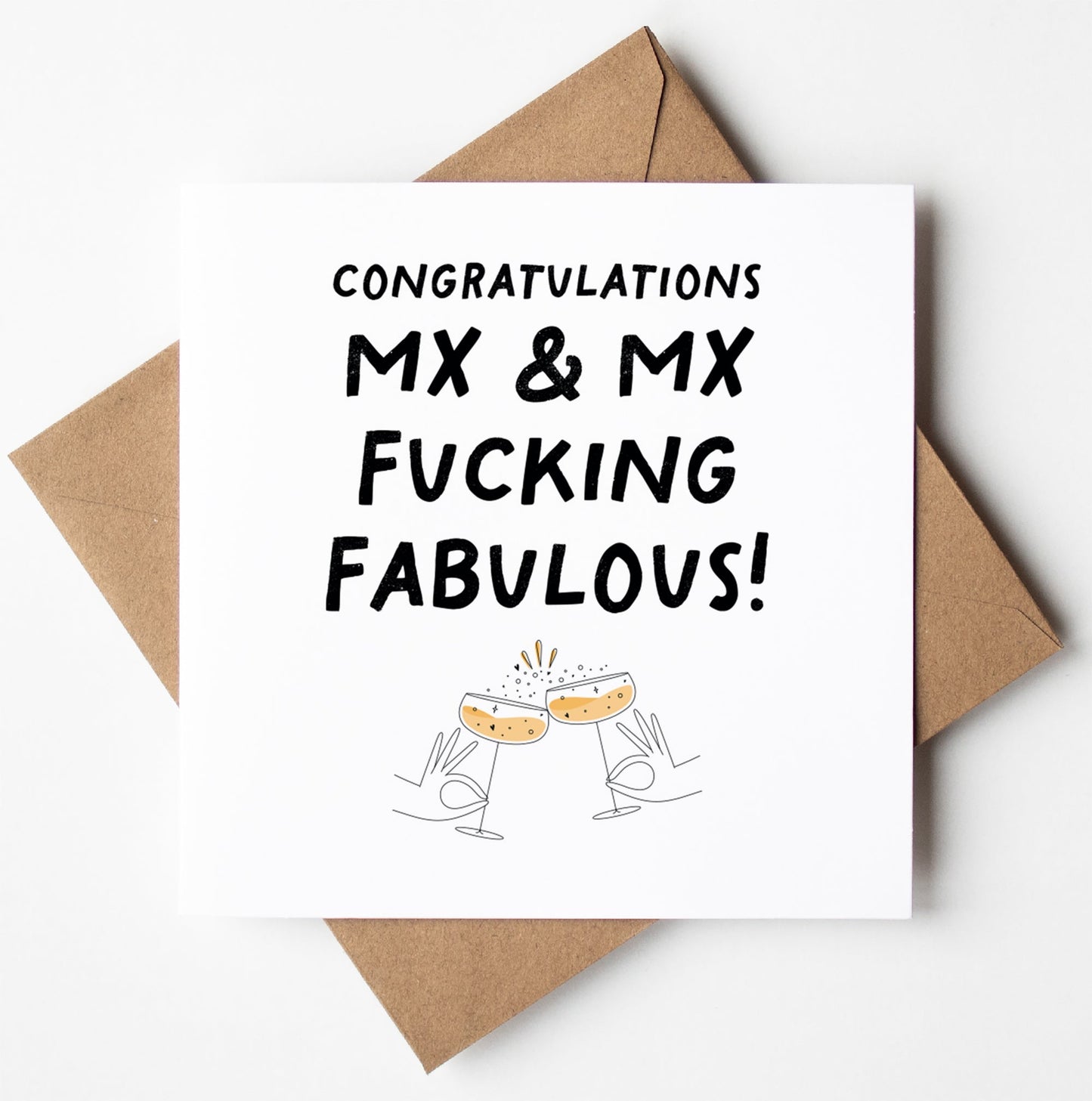 The Mx and Mx Fucking Fabulous Non-Binary Queer Wedding Card features a square design with "Congratulations MX & MX Fucking Fabulous!" text, two hands clinking champagne glasses, and is placed on a brown envelope. This biodegradable card celebrates love and offers worldwide shipping.