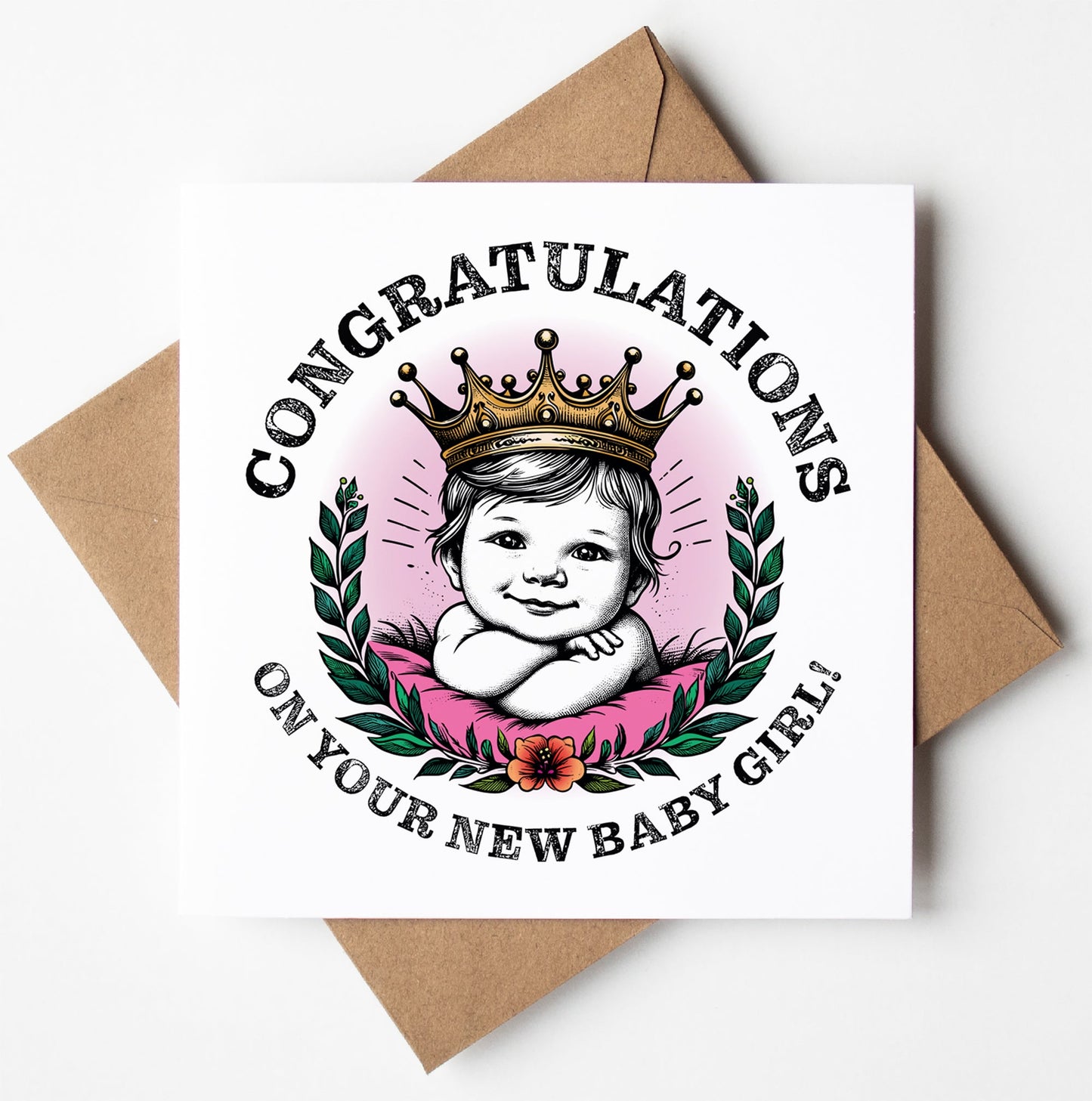A delightful card titled "Congratulations On Your New Baby Girl! Crown Card" showcases an illustration of a baby girl adorned with a crown and surrounded by a laurel wreath. This typographic greetings card bears the message "Congratulations on your new baby girl!" and comes elegantly placed on a brown envelope.