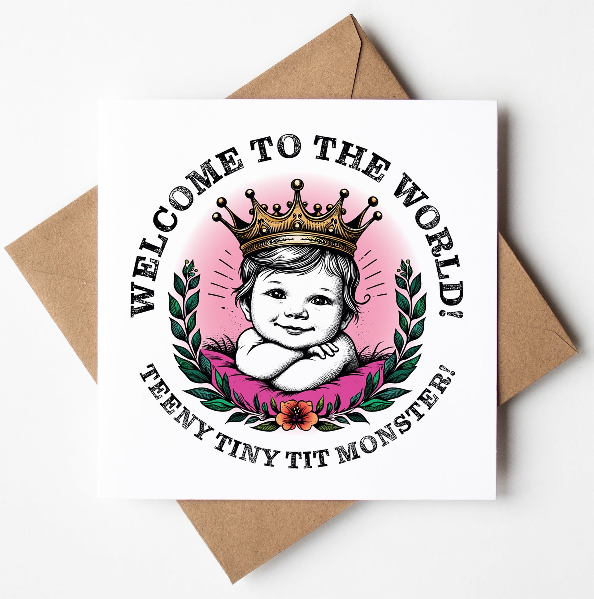 Greeting card titled "Welcome To The World Teeny Tiny Tit Monster!" featuring a cute illustration of a baby girl wearing a crown, surrounded by laurel wreaths and flowers. Includes the text: "Welcome to the World! Teeny Tiny Tit Monster!" This charming typographic greeting card is paired with a brown envelope.