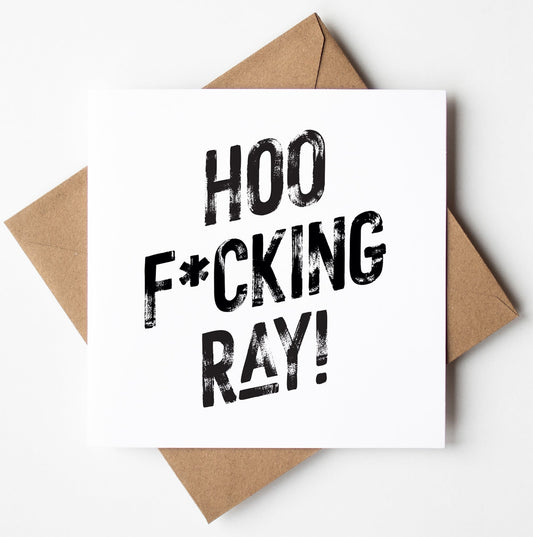 The Hoo F*cking Ray! Harlem Card showcases bold, black text on white exclaiming "HOO F*CKING RAY!" Set against a brown envelope, it's ideal for any occasion and comes with worldwide shipping.