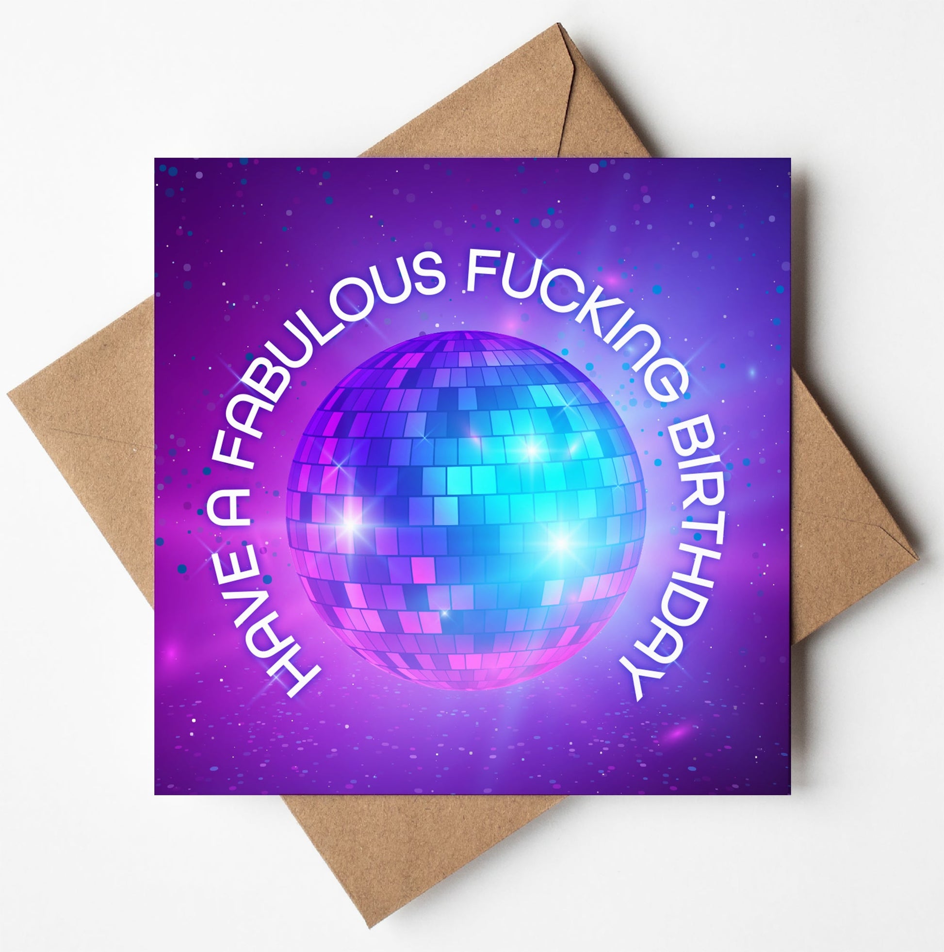 Introducing the Fabulous Fucking Disco Birthday Card: it showcases a vibrant disco ball set against a lively purple backdrop. Bold white letters display the humorous message "Have a fabulous fucking birthday," perfect for adding an adult twist to your greetings. A chic brown envelope completes this stylish and entertaining card.