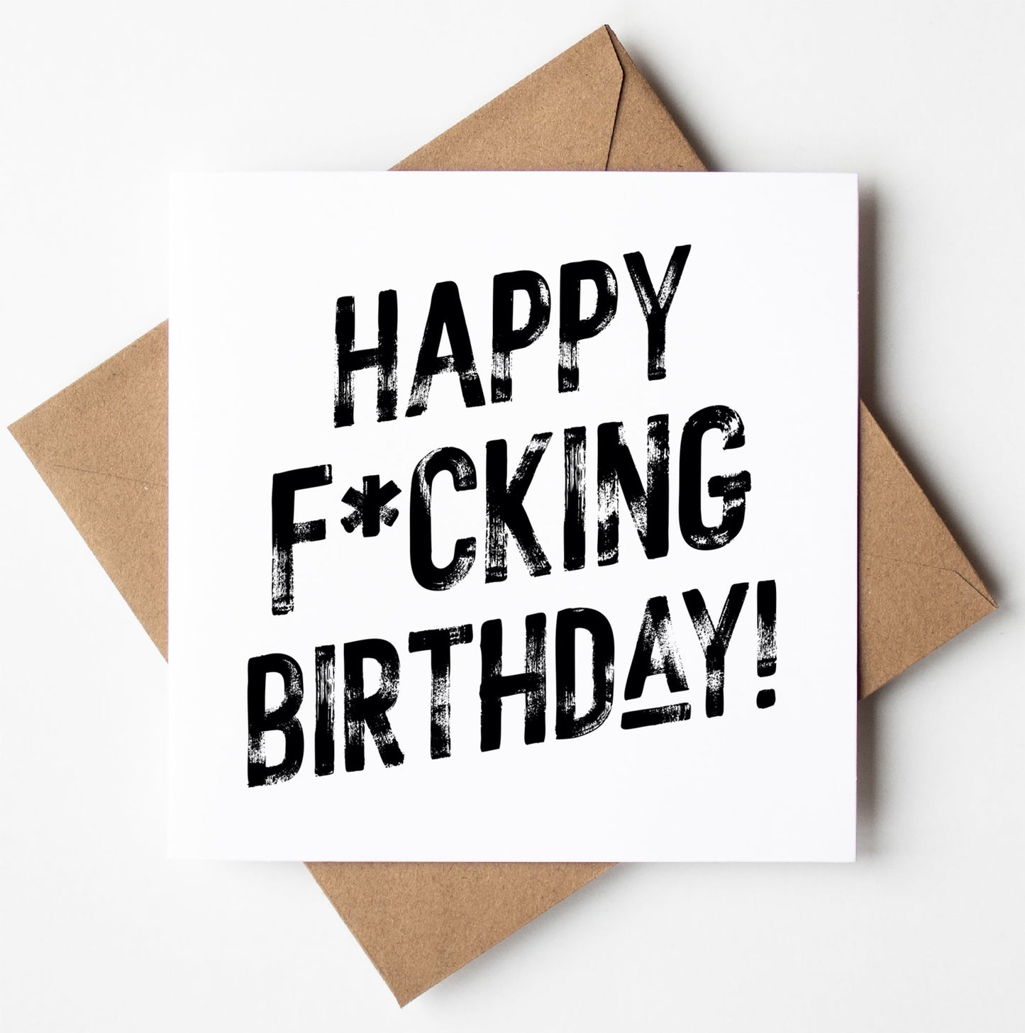 The Happy F*cking Birthday! Harlem Card features bold, distressed black text on white cardstock. Presented with a brown envelope, this unique birthday card ships worldwide.