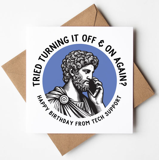 The Happy Birthday From Tech Support: Statue Dude Card features a bearded man in Roman attire holding a phone, with the message "Tried turning it off & on again? Happy birthday from tech support." Ideal for your beer-loving friends!.