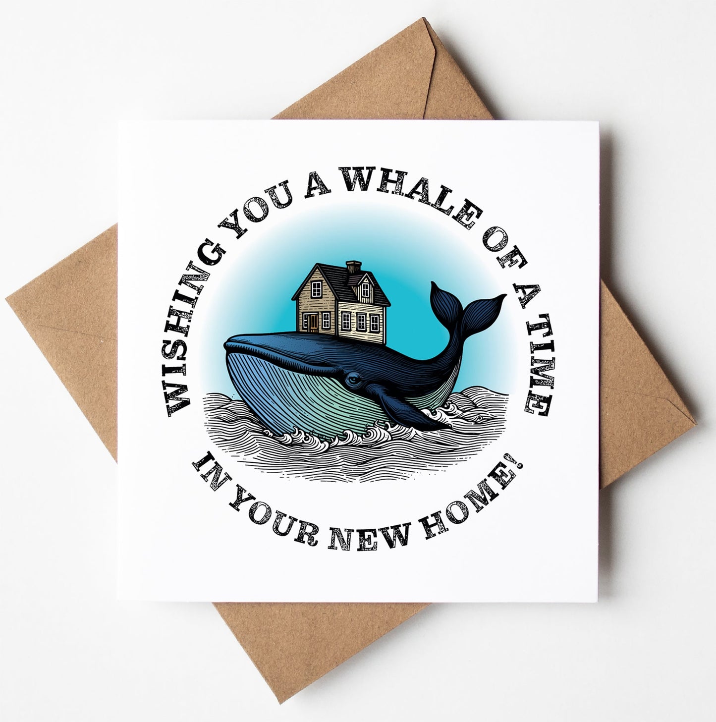 Introducing the "Wishing You A Whale Of A Time In Your New Home!" card, featuring a charming illustration of a whale carrying a small house over ocean waves. The message inside extends warm wishes for your new place. It comes nestled within a brown envelope.