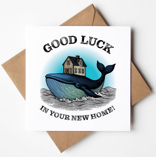 The Good Luck in Your New Home! Whale Card showcases a distinctive design of a blue whale carrying a house surrounded by swirling waves, and it comes with the message "Good luck in your new home!" This charming card is paired with a brown envelope, making it ideal for celebrating fresh starts.