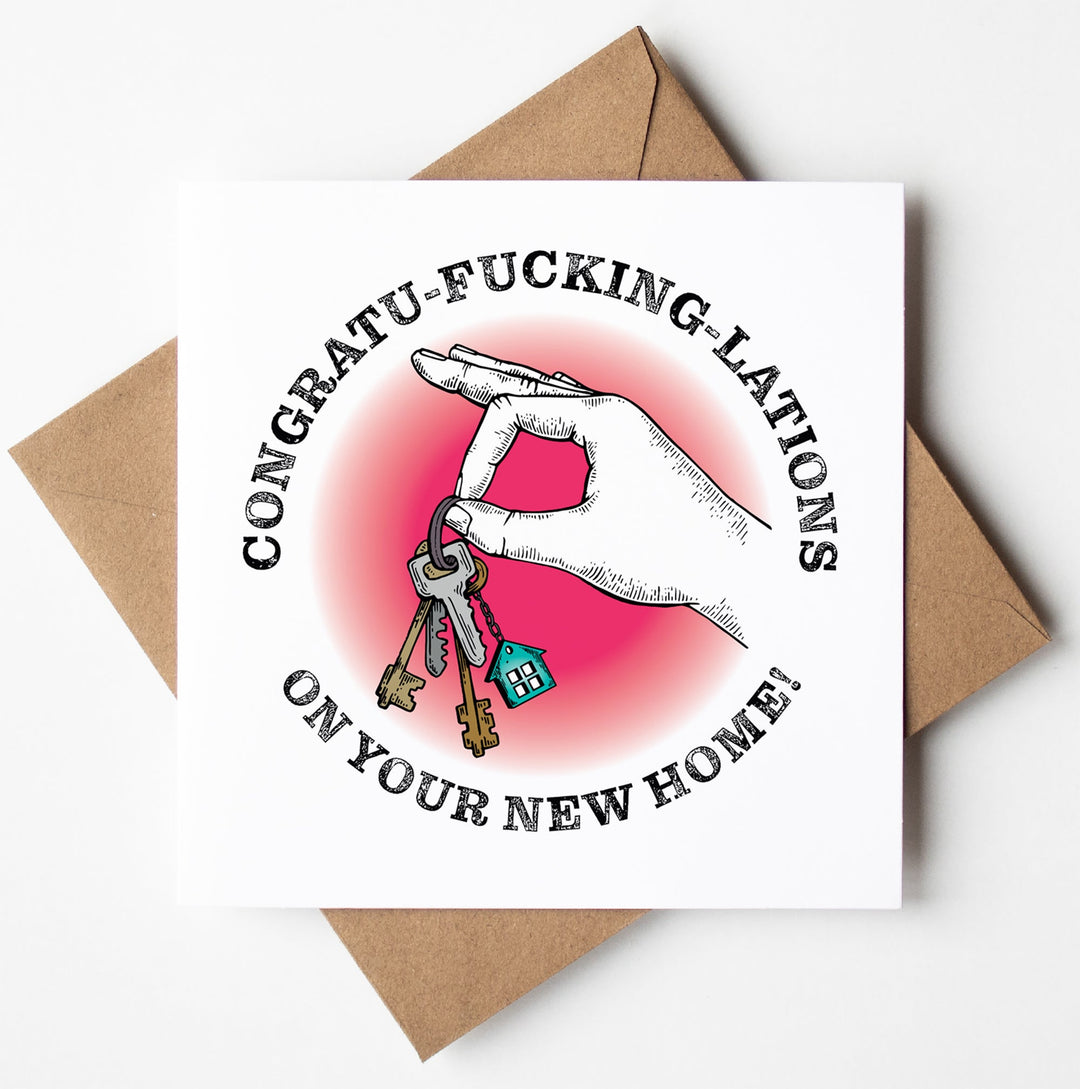 The "Congratulations On Your New Home! Keys Card" is a typographic greetings card showcasing an illustration of a hand with a keychain, complete with keys and a small house charm. The message loudly proclaims, "CONGRATU-FUCKING-LATIONS ON YOUR NEW HOME!" and it is elegantly packaged in biodegradable material.