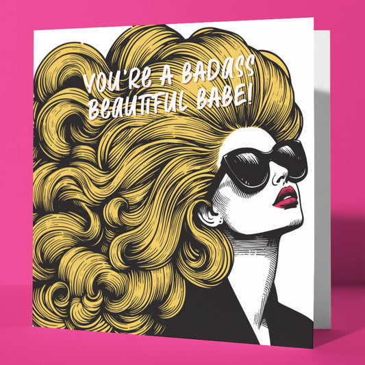 The "You're A Badass Beautiful Babe!! Vintage Babes Happy Birthday Card" features a woman with big yellow hair, red lips, and black sunglasses, with "YOU'RE A BADASS BEAUTIFUL BABE!" on a pink background—a fun birthday card!.