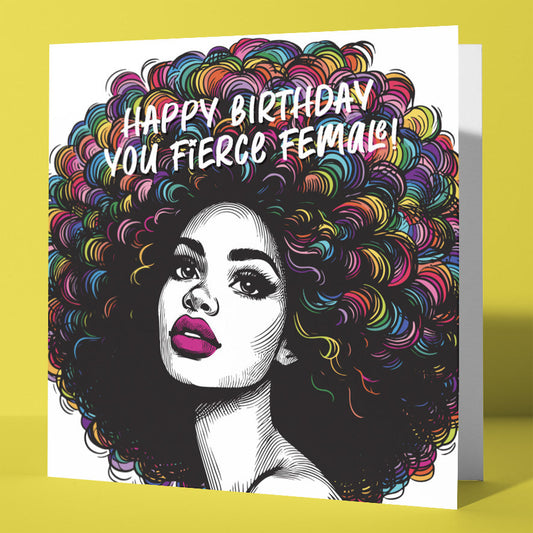 The ‘Happy Birthday You Fierce Female! Vintage Babes Birthday Card’ features a black and white illustrated woman with vibrant, curly multicolored hair and bold text on a bright yellow background—perfect for an Afro birthday celebration.