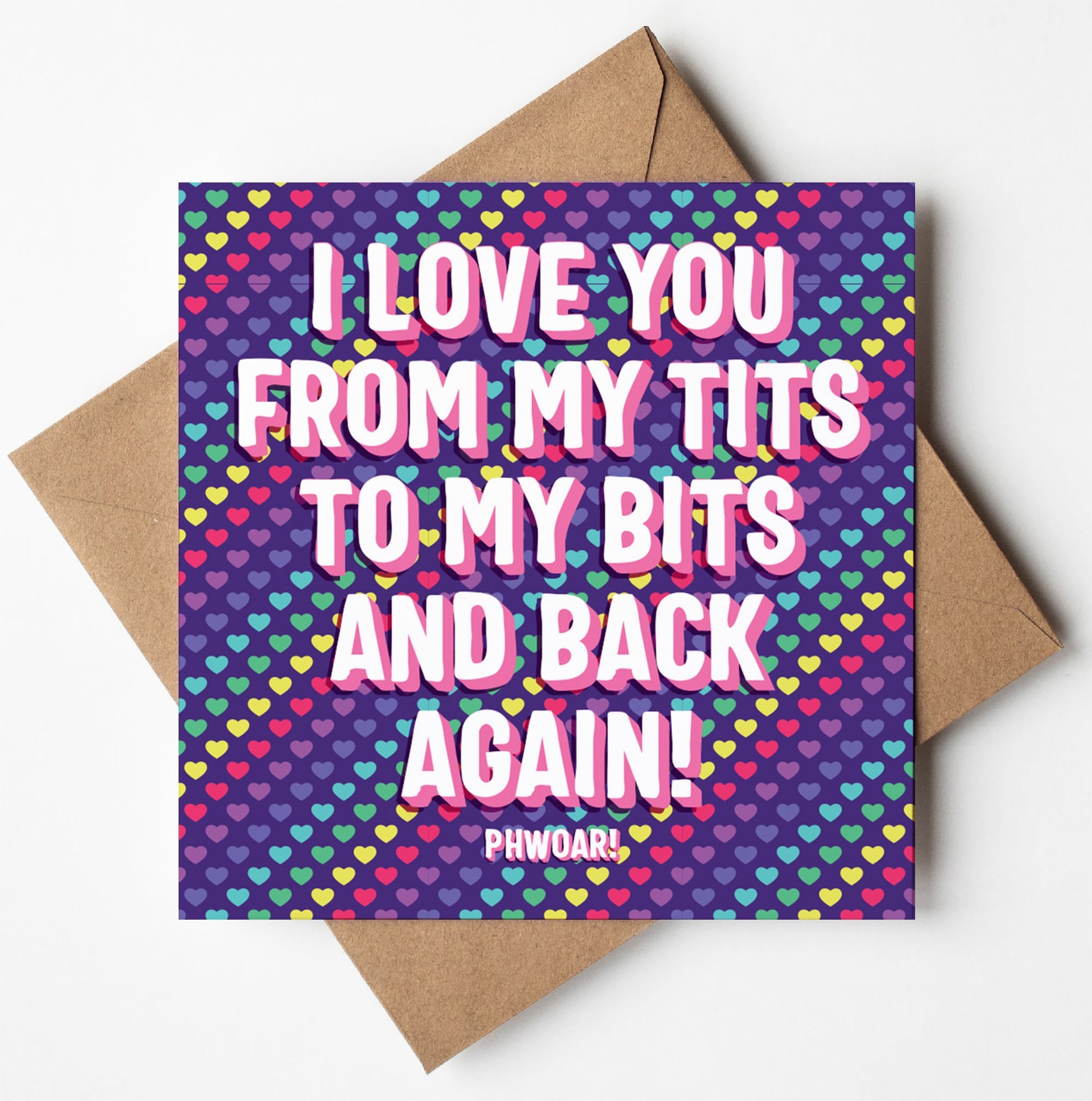 A Valentine's Day card named "I Love You From My Bits To My Tits Card" features a purple background adorned with small, colorful hearts. The card showcases bold white text declaring, "I LOVE YOU FROM MY TITS TO MY BITS AND BACK AGAIN! PHWOAR!" and is presented with a brown envelope.