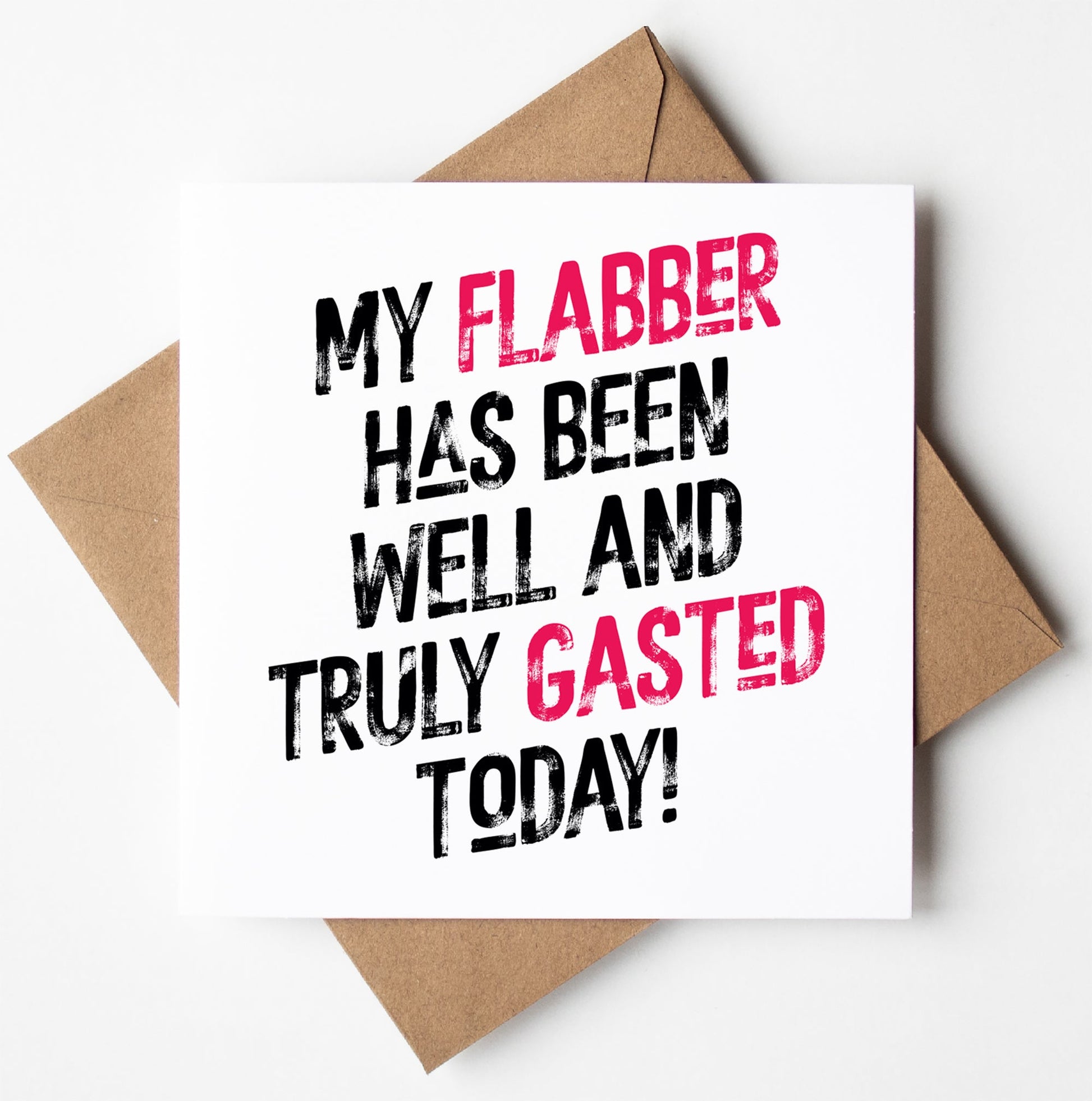 The My Flabber Has Been Gasted! Harlem Card showcases striking black and pink text with the exclamation, "MY FLABBER HAS BEEN WELL AND TRULY GASTED TODAY!" It is delivered in a brown envelope, making it ideal for gifting. Benefit from worldwide shipping and its creation from eco-friendly, biodegradable materials.