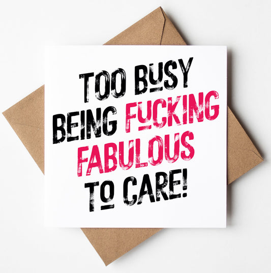 The "Too Busy Being Fucking Fabulous To Care! Harlem Card" showcases bold black and pink text on a white card with a brown envelope. Ideal as a sweary birthday card, it delivers the perfect declaration.