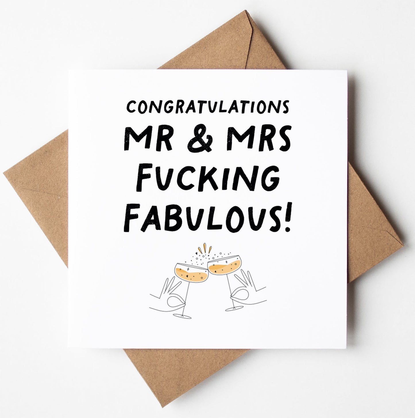 The Mr and Mrs Fucking Fabulous Wedding Card is a biodegradable greeting card that comes in a brown envelope and features the message, "Congratulations Mr & Mrs Fucking Fabulous!" along with an illustration of two hands clinking champagne glasses. With worldwide shipping available, it's the ideal wedding card to celebrate love and laughter.