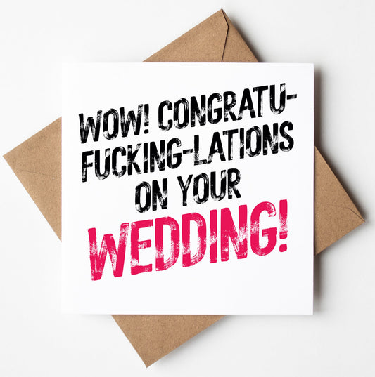 A card from the "Congratulations On Your Wedding! Sweary Card" collection, perched on a brown envelope, boldly proclaims, "WOW! CONGRATU-FKING-LATIONS ON YOUR WEDDING!" in striking black and pink text. This edgy design adds flair to its cheeky congratulations, while its biodegradable bag ensures that it's both entertaining and environmentally friendly.