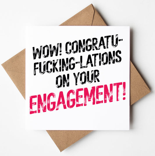 A bold and cheeky greetings card named "Congratulations On Your Engagement! Sweary Card" showcases the phrase "Wow! Congratu-fucking-lations on your engagement!" with the word "engagement" highlighted in pink, accompanied by a brown envelope.