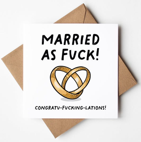The "Married As Fuck! Congratulations Wedding Card (M/F)" features bold text, "MARRIED AS FUCK!" with intertwined gold rings and declares "CONGRATU-FUCKING-LATIONS!" Perfect for congratulations, it's blank inside for a personal message and includes a brown envelope.