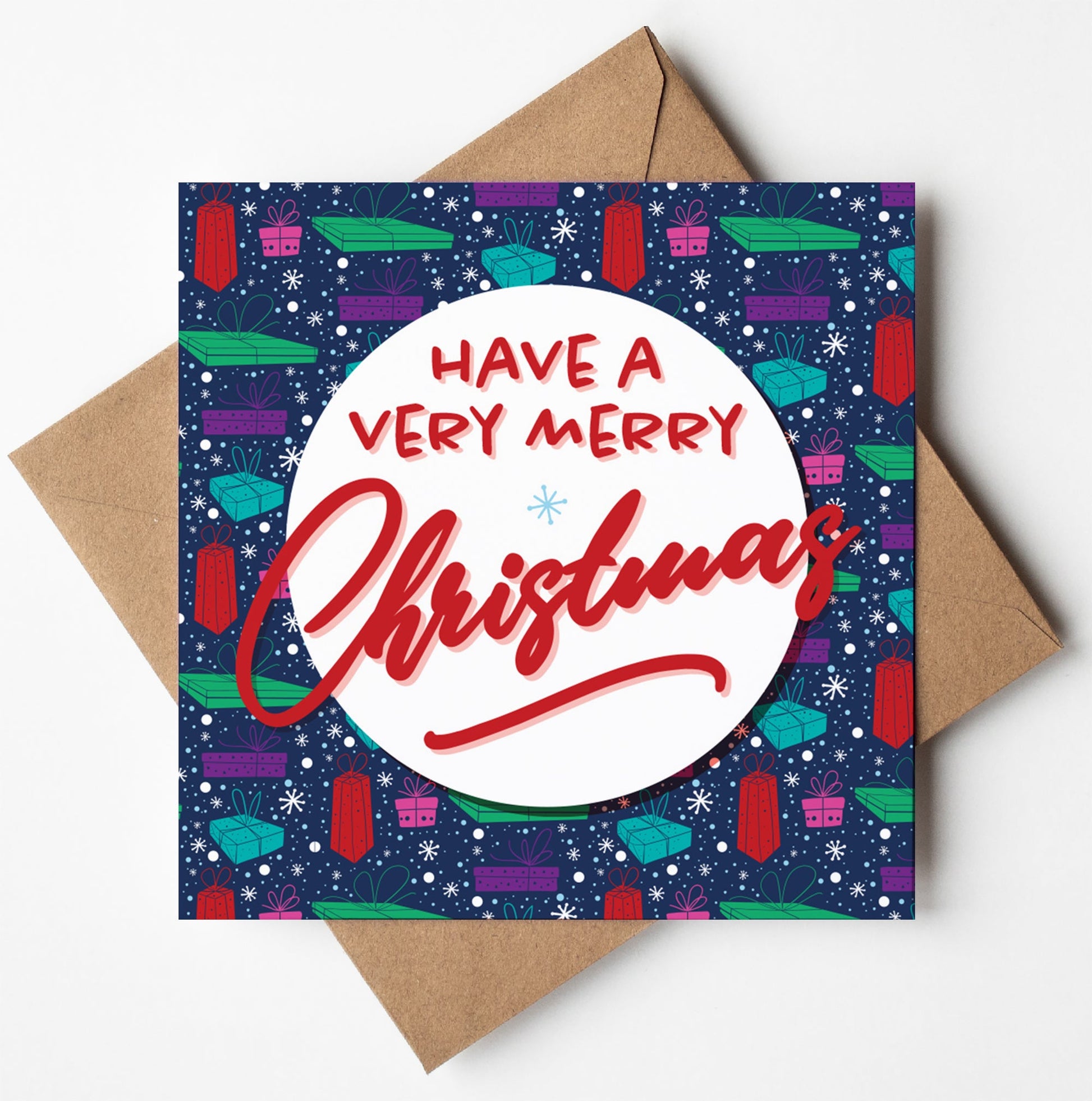 The "Have a Very Merry Christmas Pressies Navy Card" is a square Christmas card with a navy background that showcases red and green gift illustrations. At its center, a white circle contains the message "Have a Very Merry Christmas" in red and teal. It comes with an envelope, making it perfect for sending holiday cheer with worldwide shipping options available.