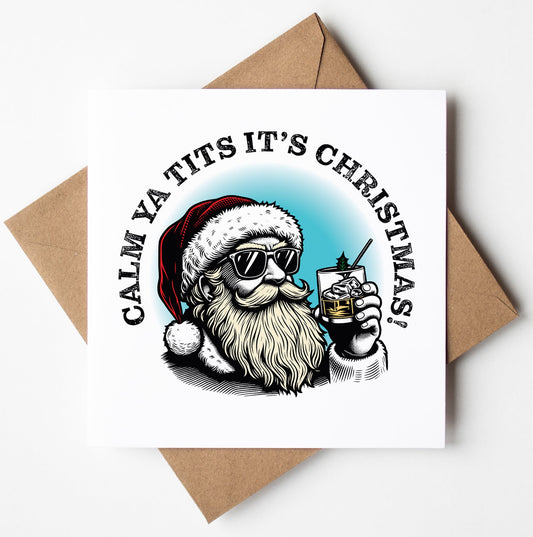 The "Sunglass Santa's Calm Ya Tits It's Christmas! Card" features a playful illustration of a cool Santa wearing sunglasses and holding a drink. The card humorously proclaims, "Calm ya tits it's Christmas!" and adds a cheeky touch to the festive spirit. It comes with a brown envelope.