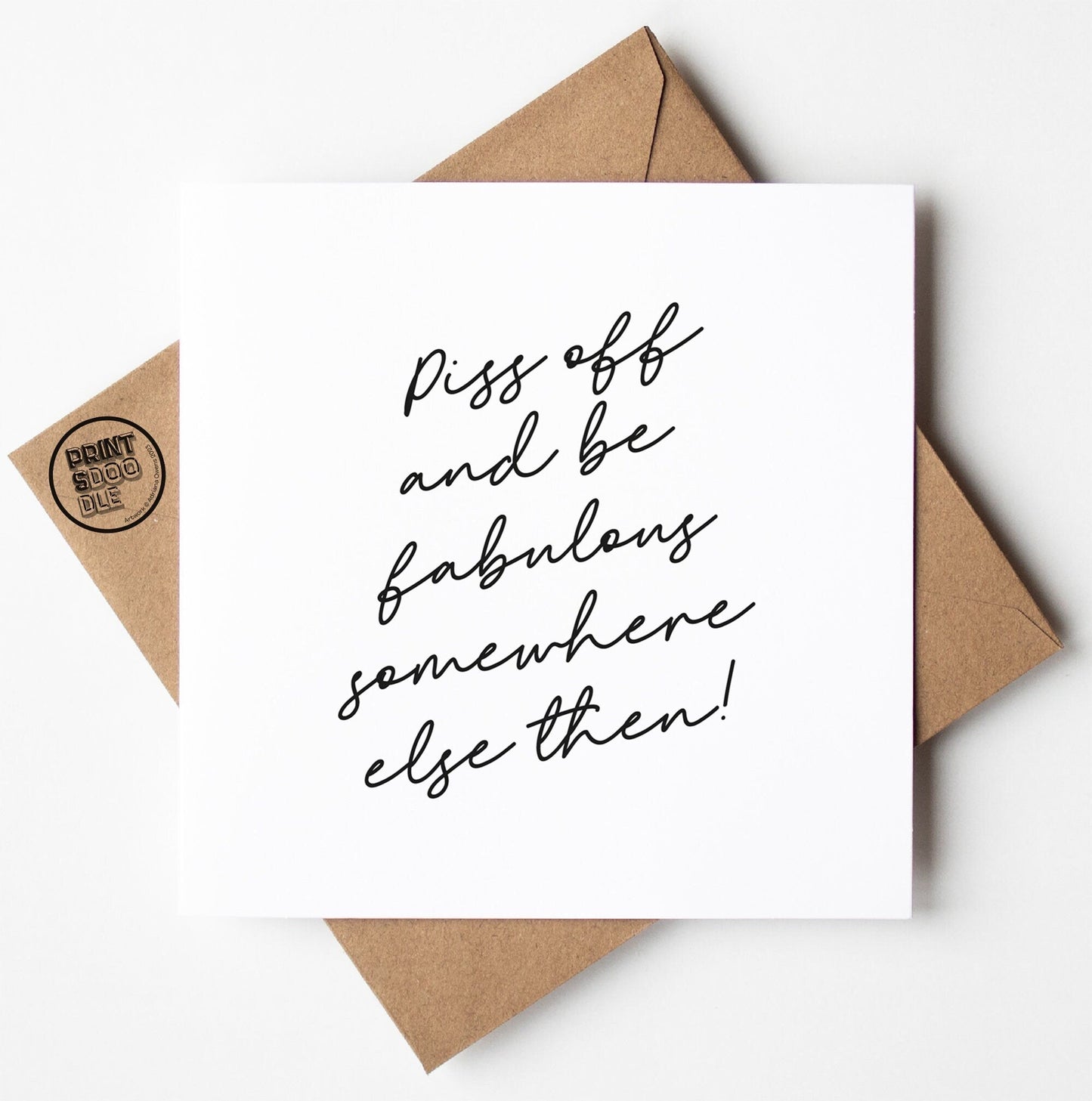 The Piss Off Fabulous Script Card showcases a handwritten message in black cursive text that reads, "Piss off and be fabulous somewhere else then!" This minimalist leaving card is paired with a brown envelope featuring a small logo in the top corner, and it is ready for worldwide shipping.